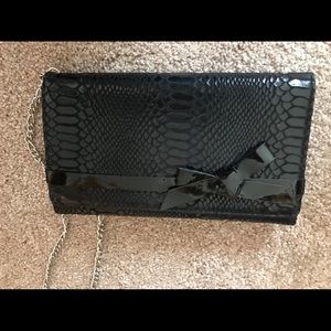 White House/Black Market clutch purse in black